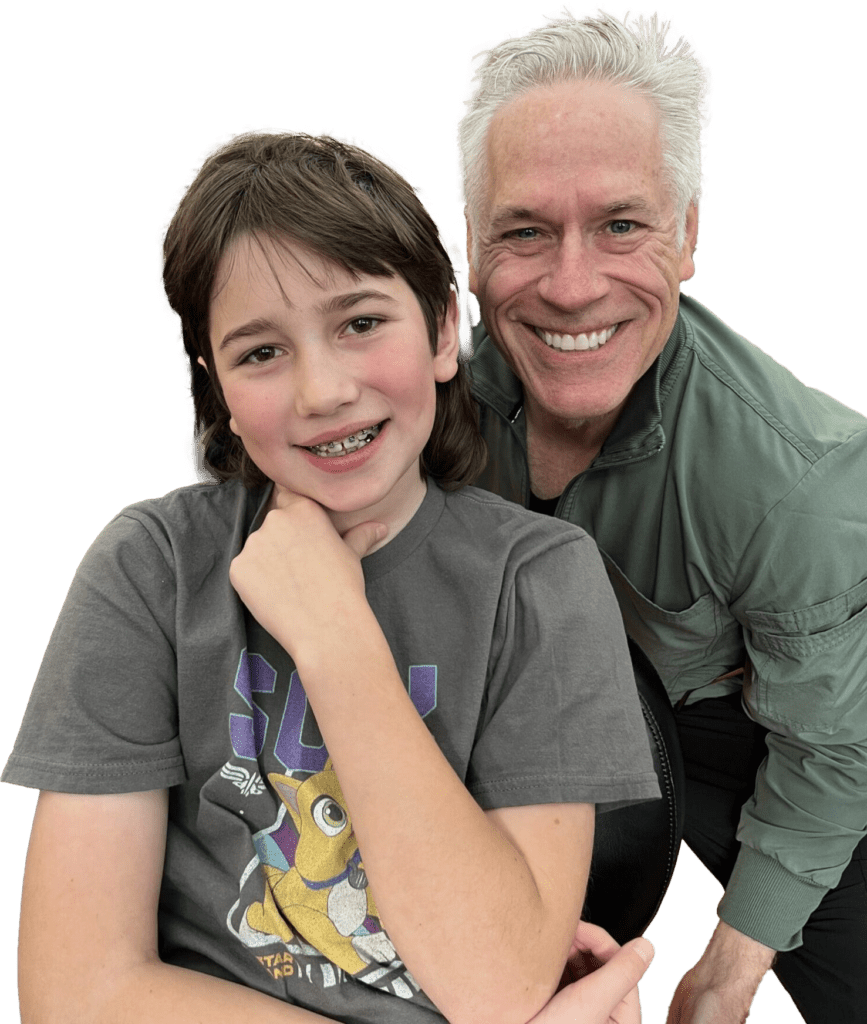 a picture of dr. roeder with a male patient wearing braces