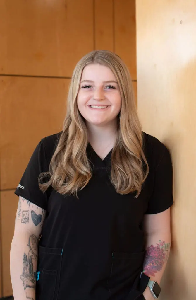 a woman smiling at camera