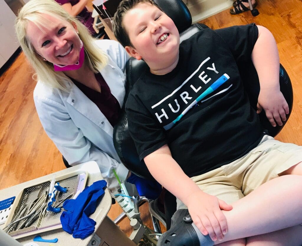 Staff and patient at Roeder Orthodontics in Asheville, NC